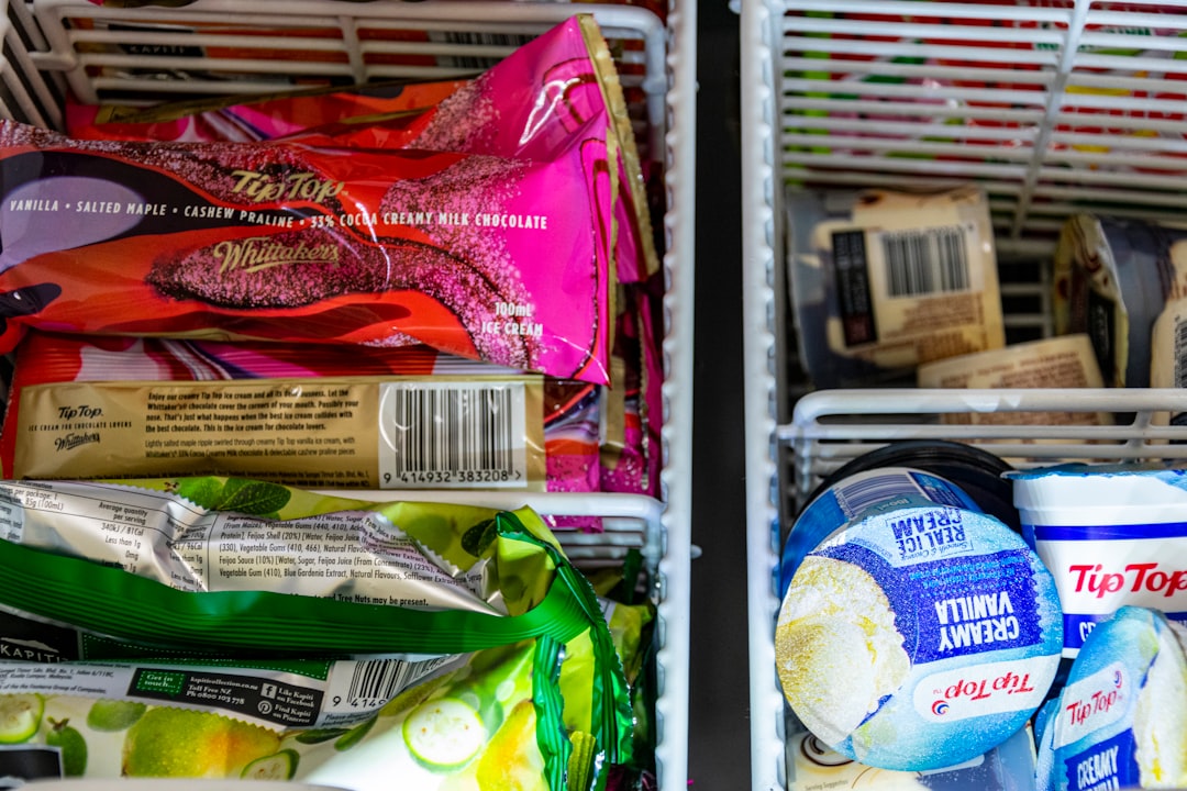 An organized chest freezer with neatly stacked vacuum-sealed packages