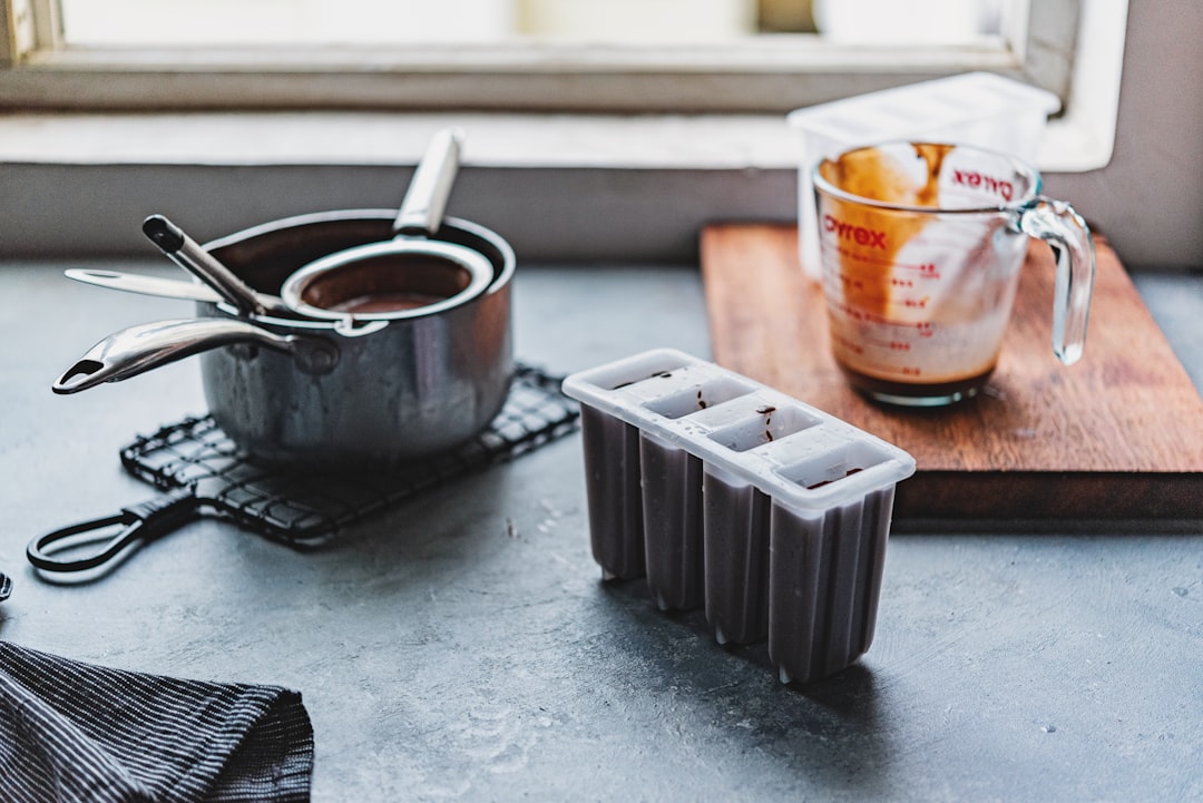 Silicone freezer trays with portioned soup ready for storage