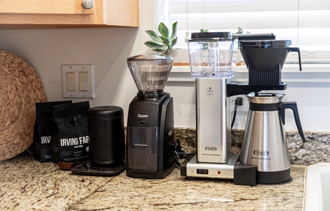 Burr coffee grinder on a kitchen counter