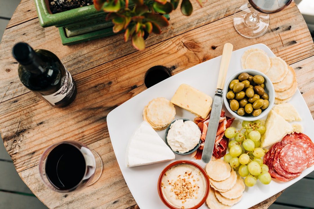 Charcuterie and cheese board on a wooden serving board