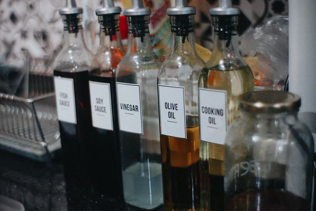 Spice jars with clean labels on a kitchen counter