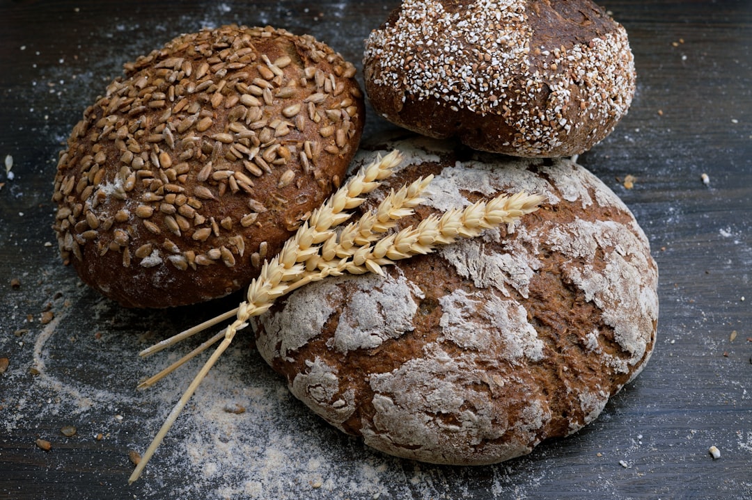 Fresh baked rustic bread loaves on cooling rack