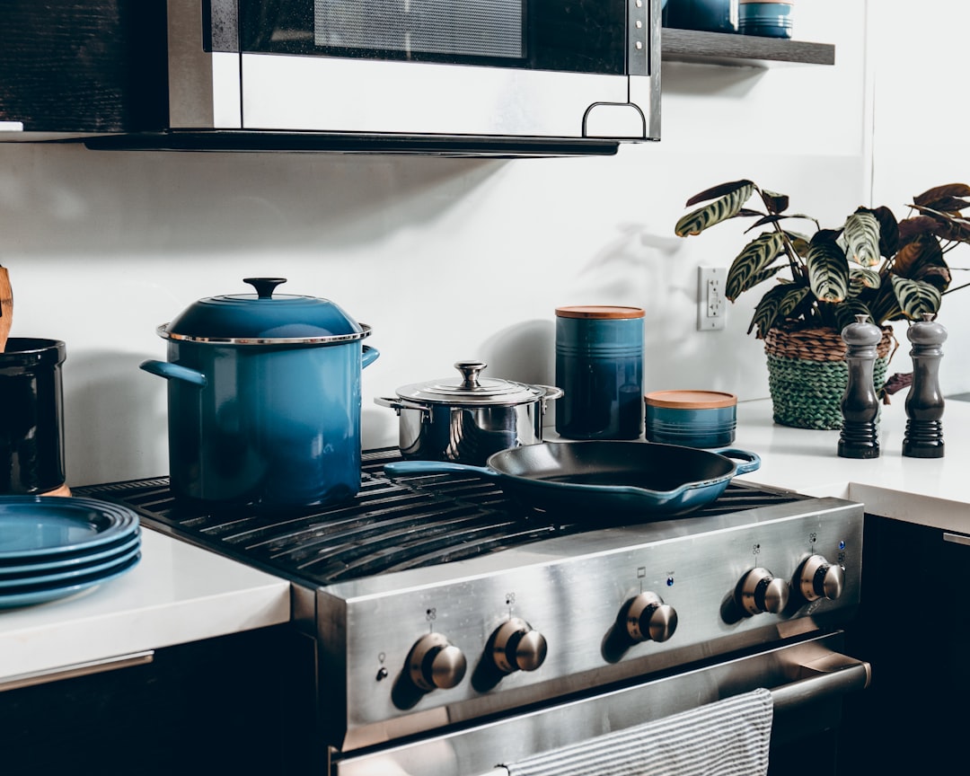 Small stainless steel kitchen appliance on counter
