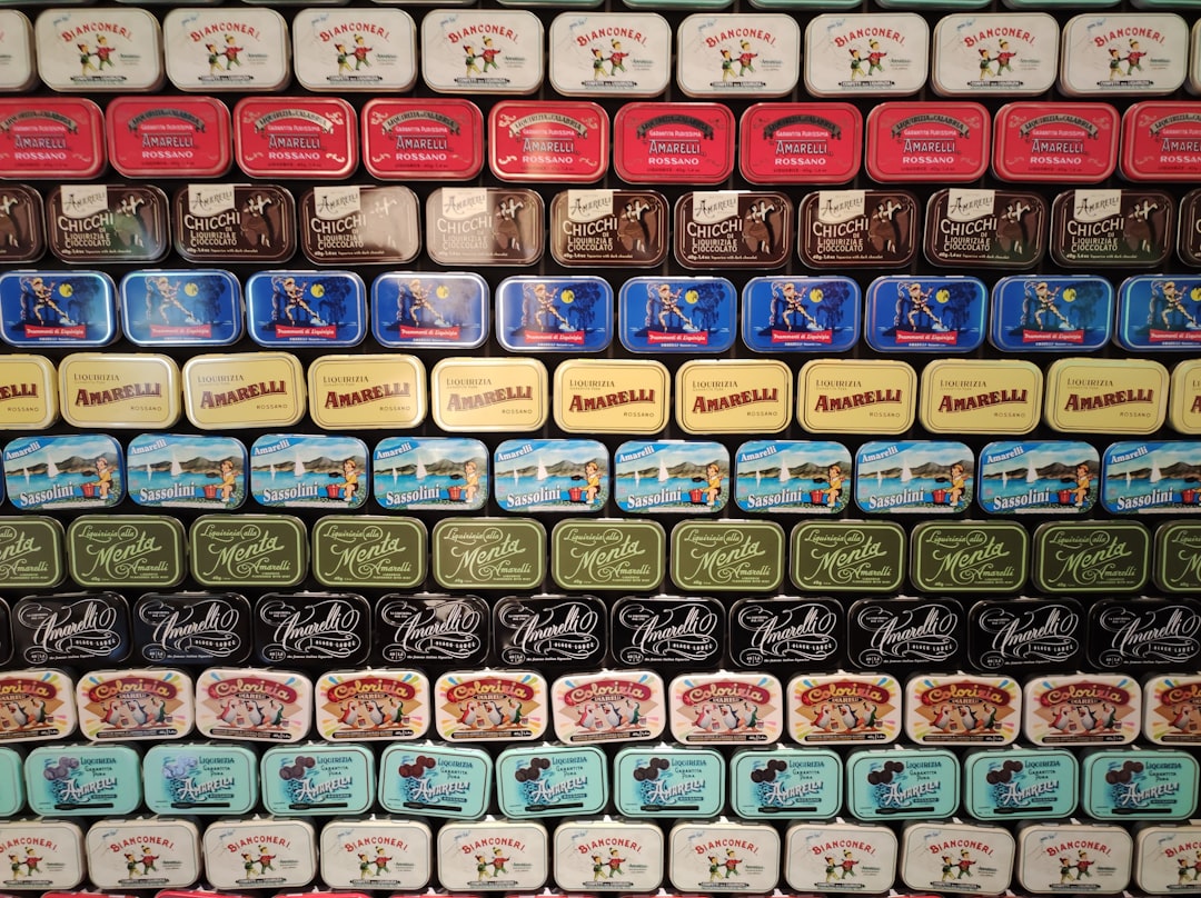 Magnetic spice tins mounted on a kitchen wall