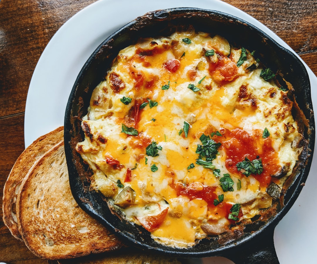 Breakfast being cooked on an electric skillet