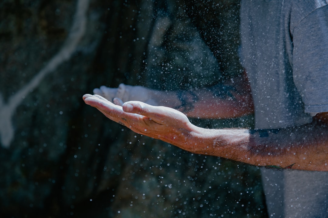 Coarse kosher salt held in open hands