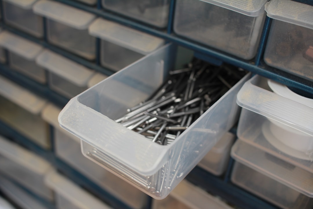 Clear stackable storage bins holding packaged goods