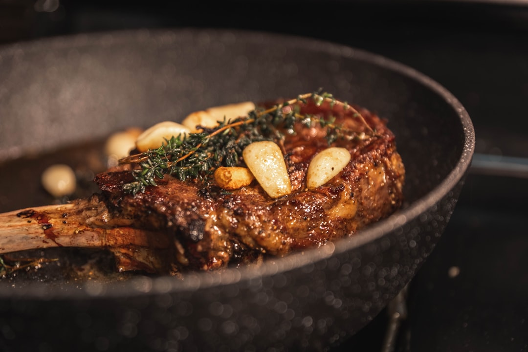 Braising meat in a skillet with rich brown sauce