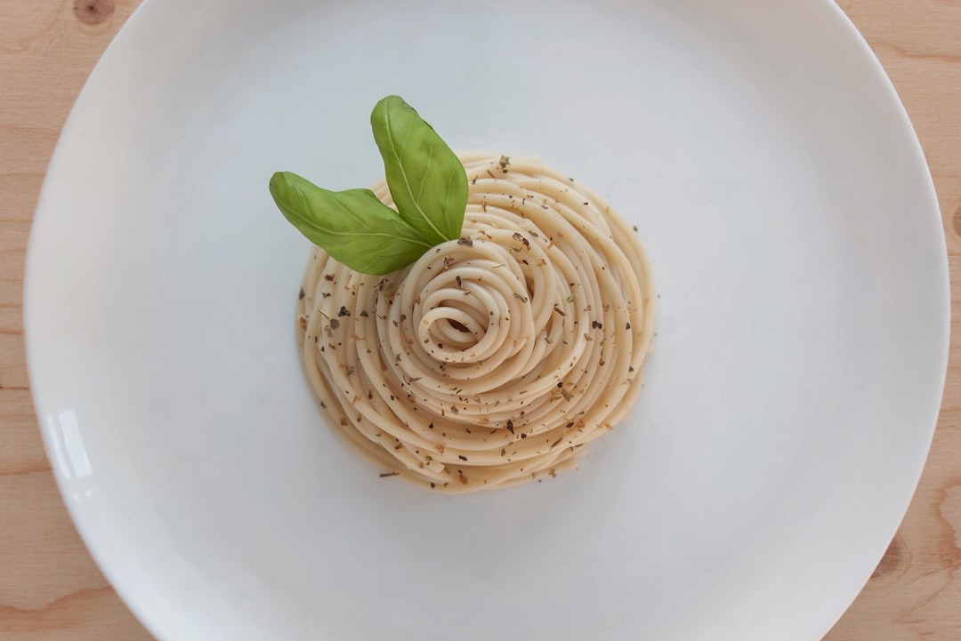 Plate of twirled spaghetti ready to serve