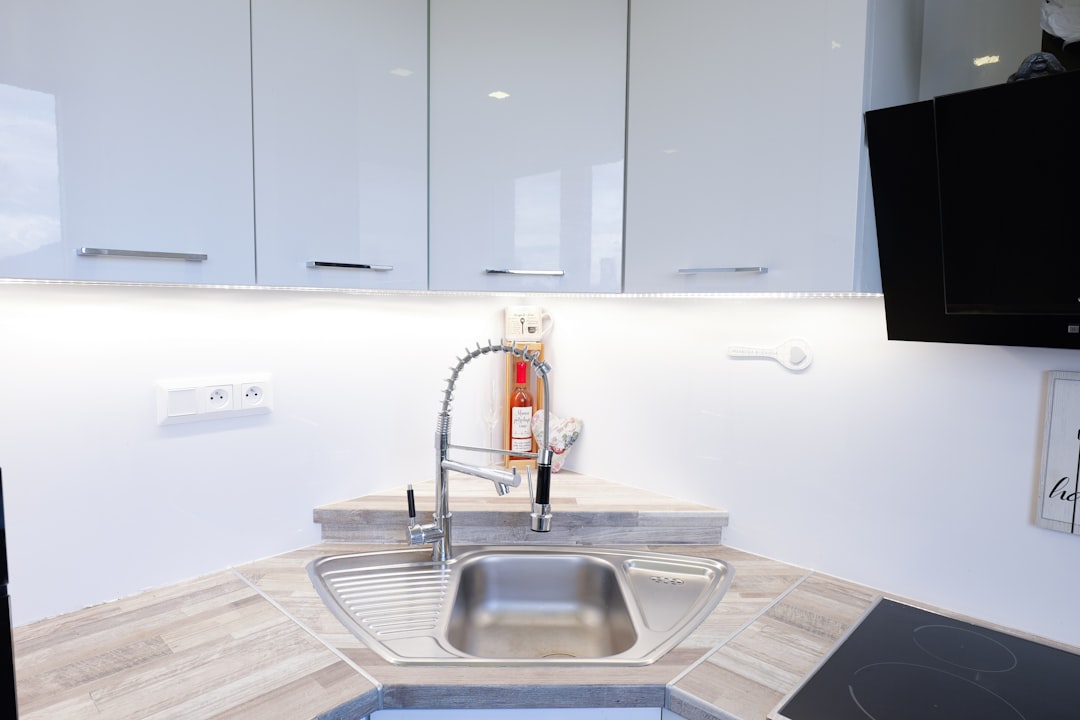 Corner kitchen cabinet with organized storage showing how awkward angles can be tamed