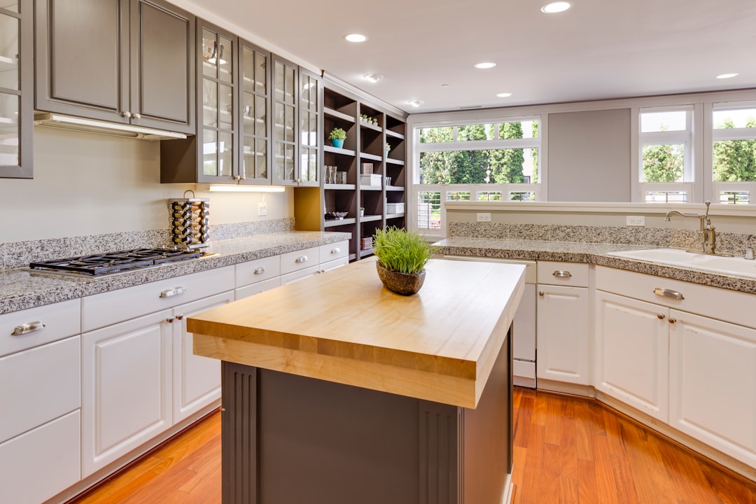 Modern rolling kitchen island with wood top and locking casters