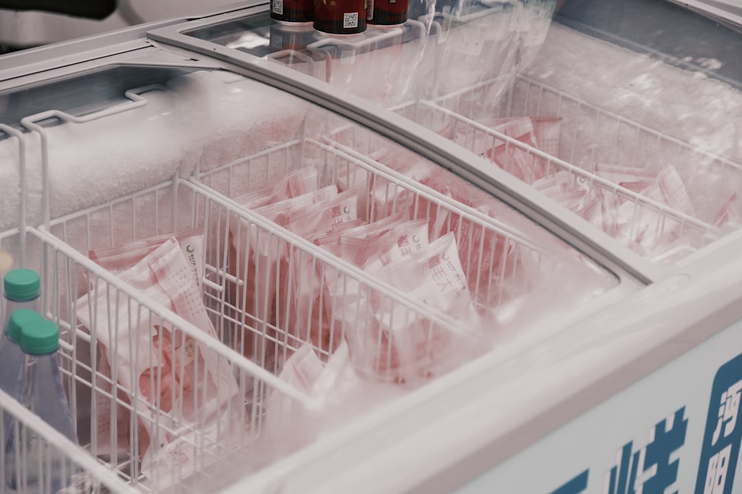 Chest freezer packed with frozen meal packages