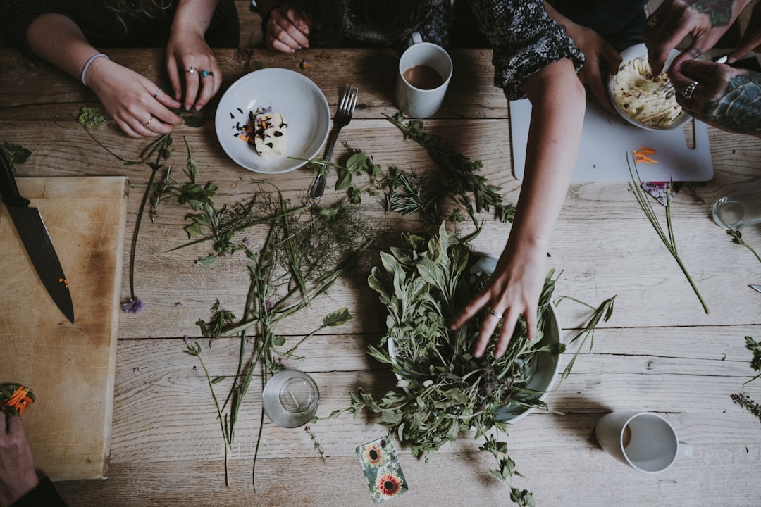 Fresh herbs scattered over a finished dish for color and aroma