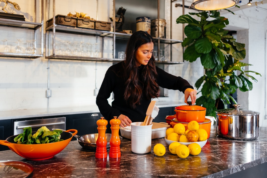 Home cook preparing a meal in a warm kitchen