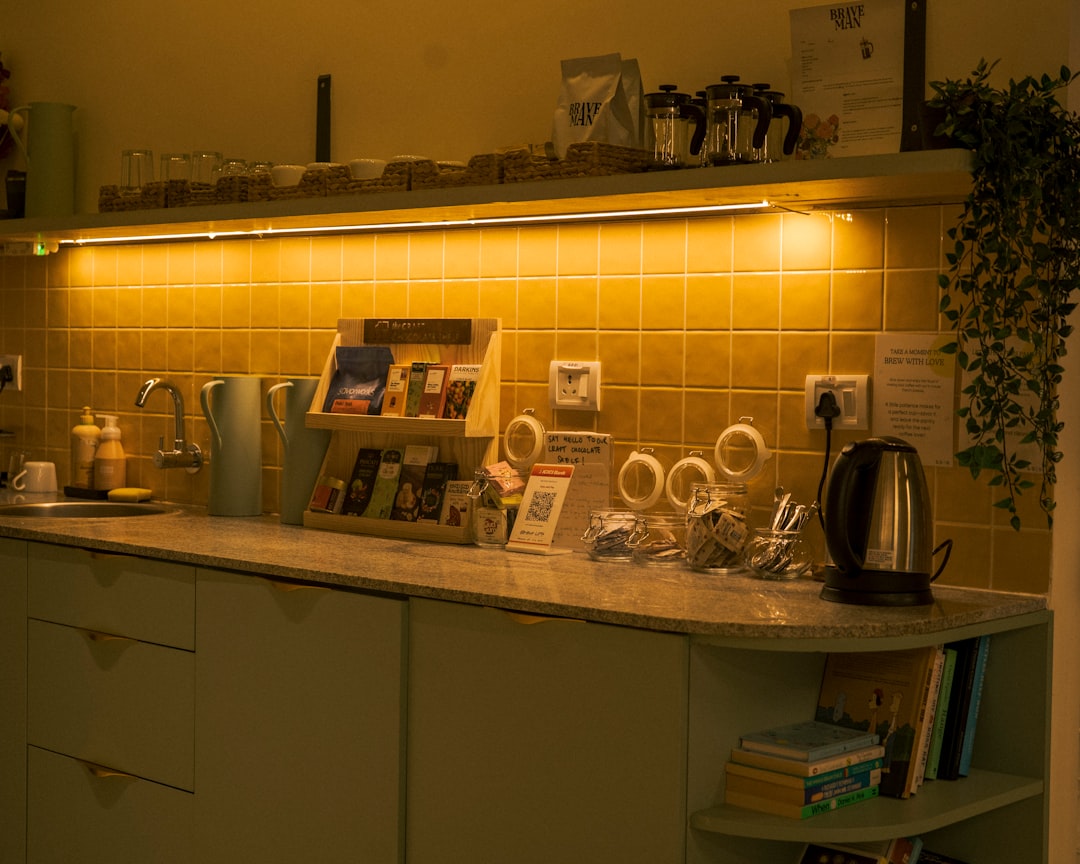 A tidy coffee station arranged on a kitchen counter