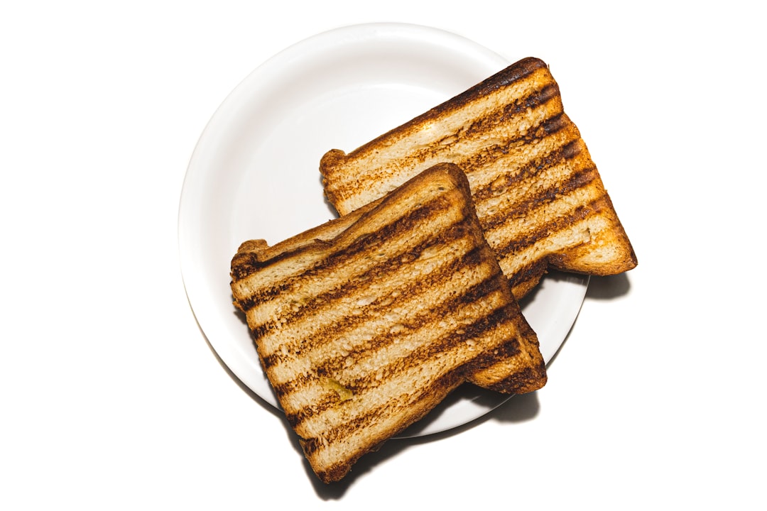 Two slices of golden toast on a plate