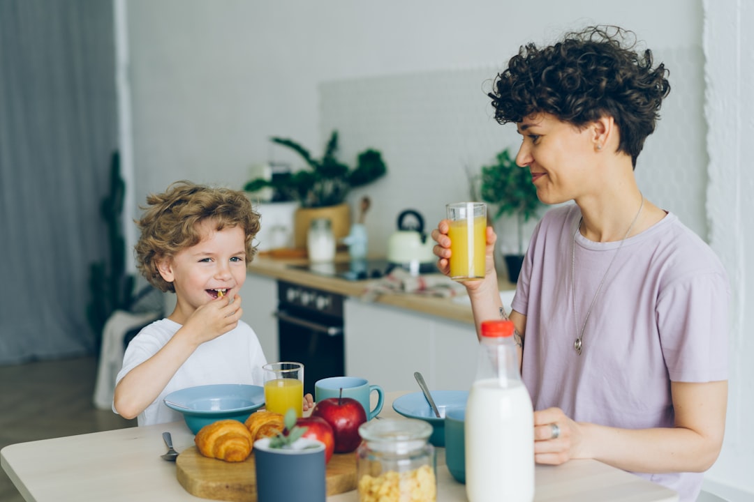 Family gathered around the kitchen on a summer morning