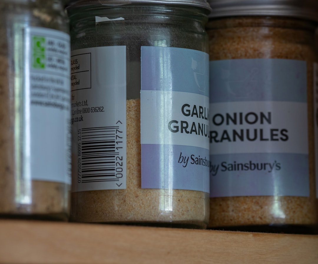 Labeled spice jars organized in a kitchen pantry