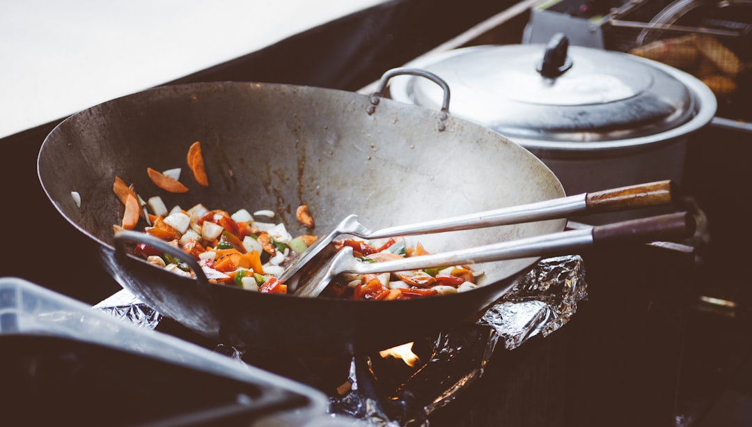 Stir fry vegetables being cooked in a hot skillet