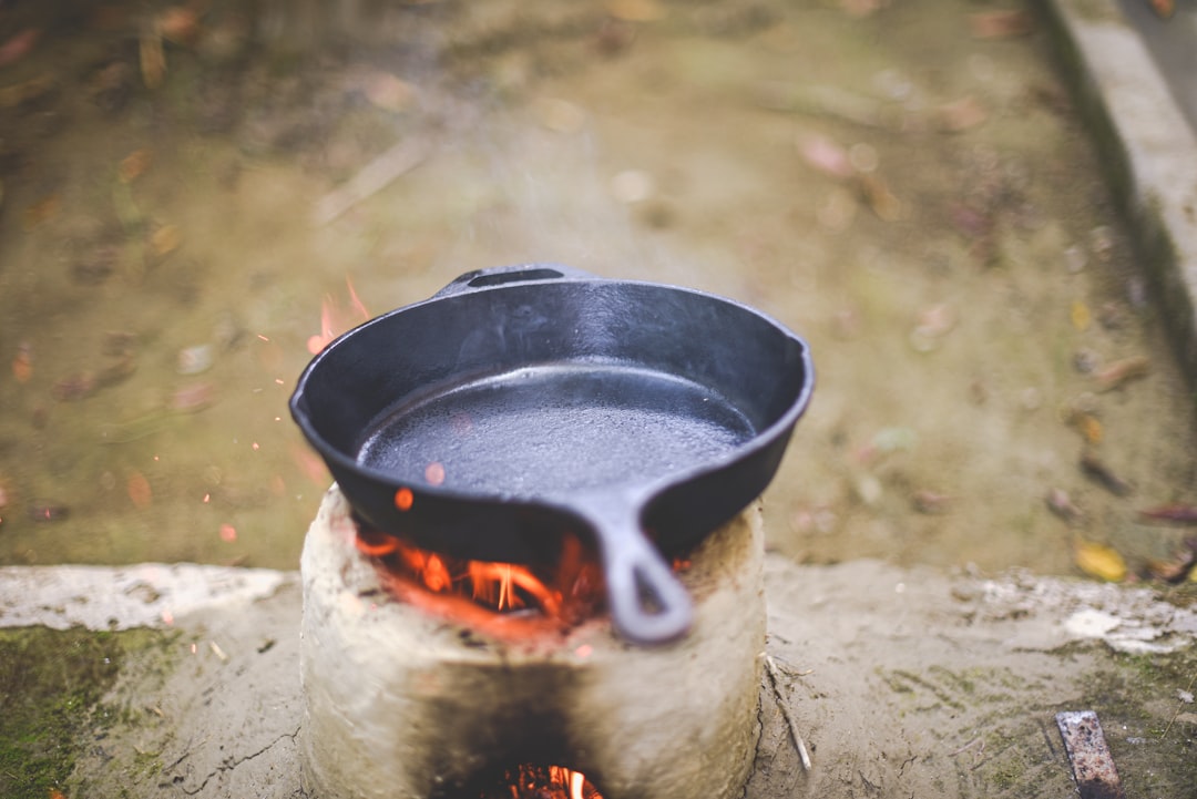 Cast iron skillet with beautifully developed fond after searing