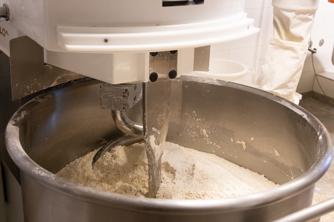 Stand mixer kneading dough in a bowl