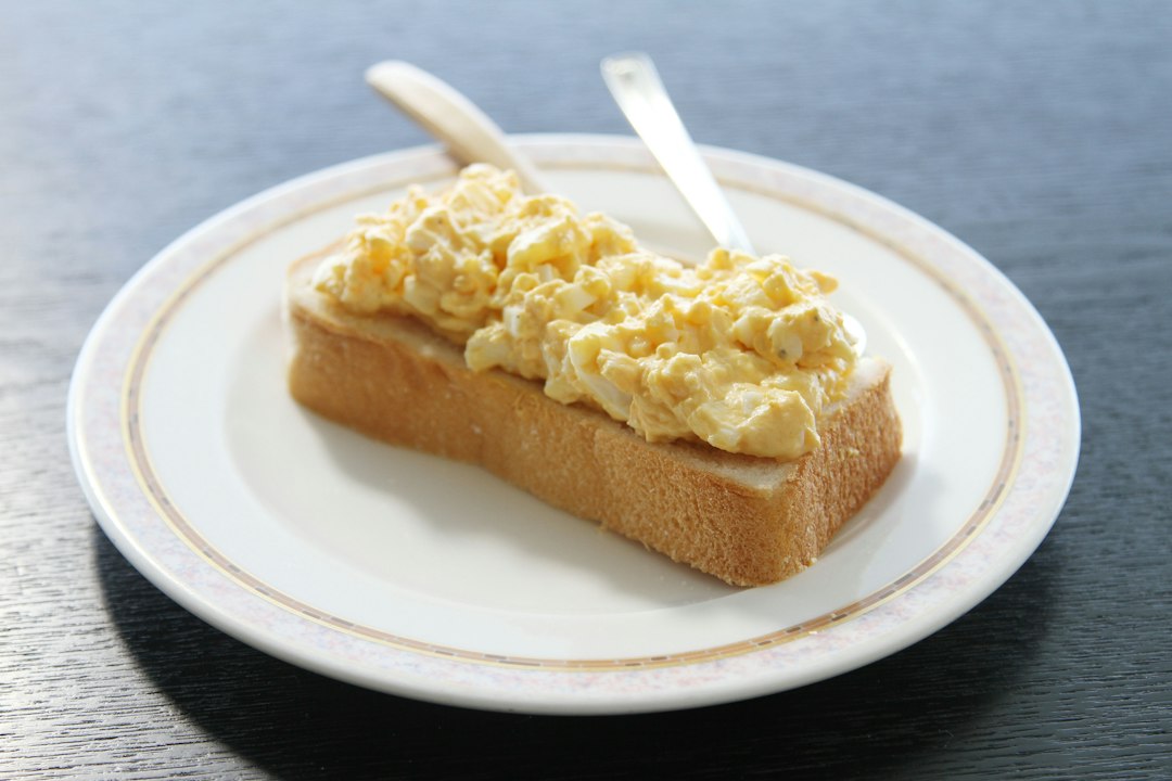 Soft creamy scrambled eggs served on toast