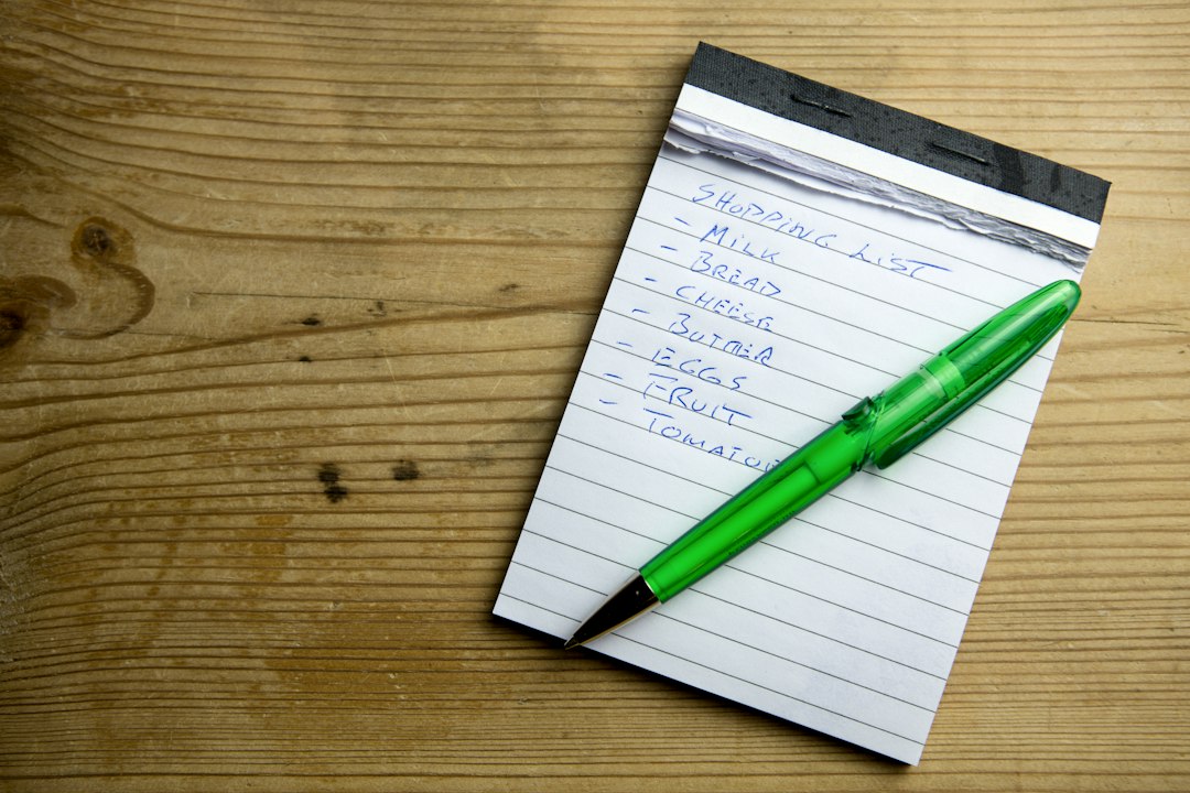 Handwritten kitchen wish list on a notepad