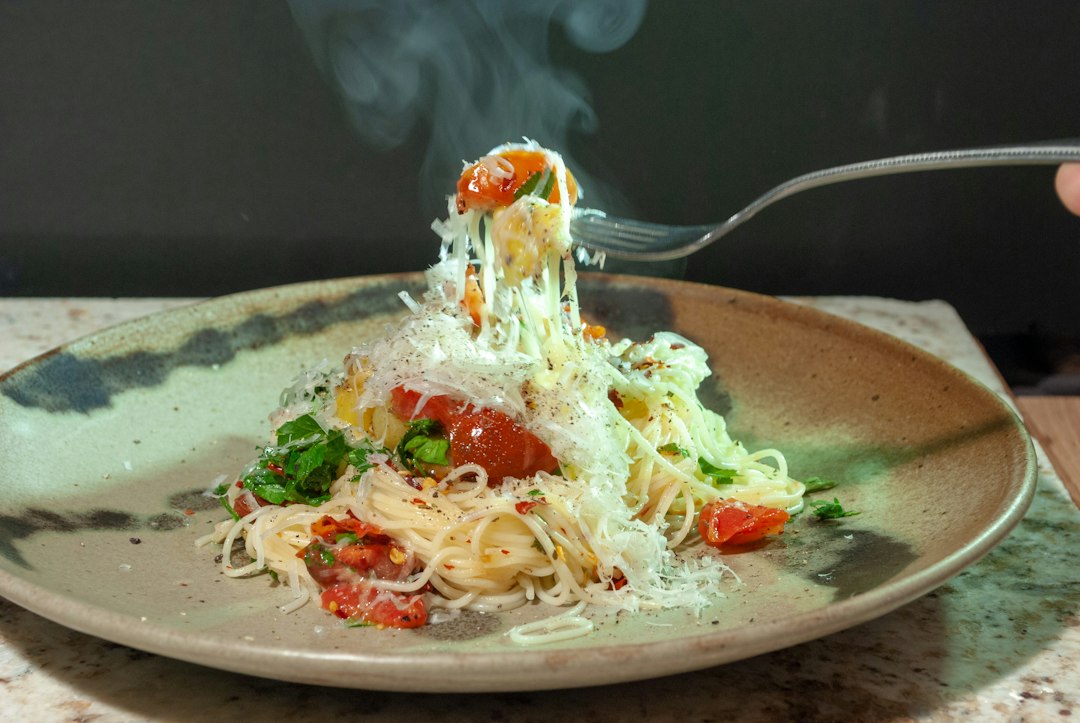 A plated pasta dinner where the weeknight garlic work pays off