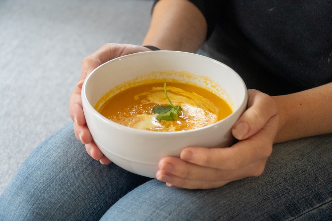 Cozy autumn kitchen with a pot of soup on the stove