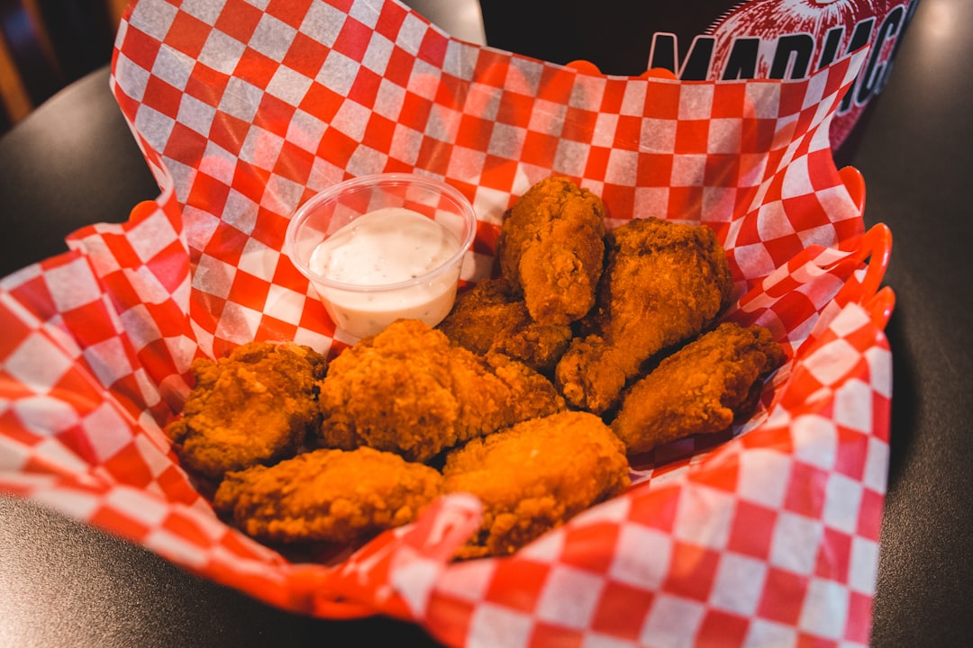Crispy chicken wings in a basket