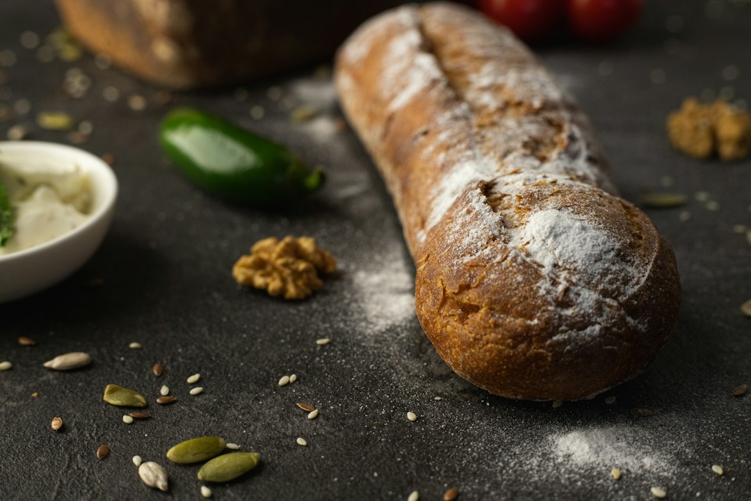 Rustic pumpkin bread loaf topped with seeds