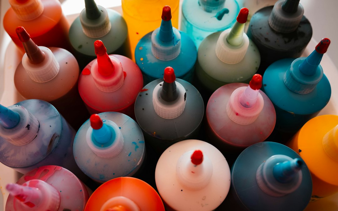 Assorted liquid and gel food coloring bottles for baking