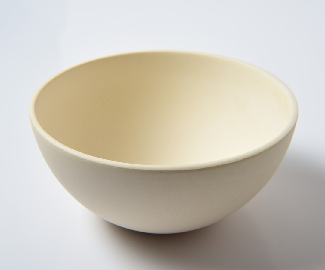 Traditional off-white ceramic mixing bowl