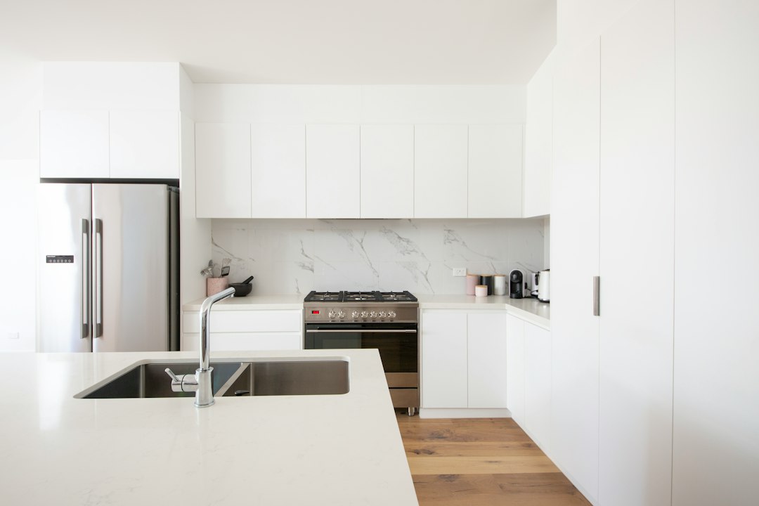 Bright minimal kitchen counter with clean white surfaces