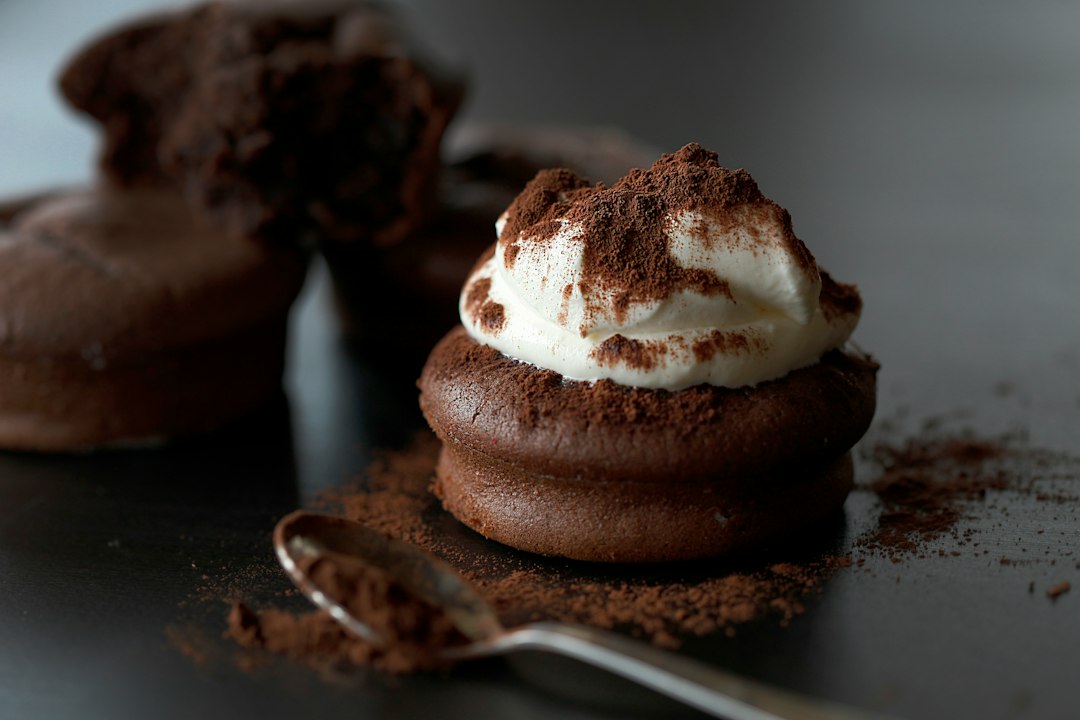whipped cream dollop on a chocolate dessert