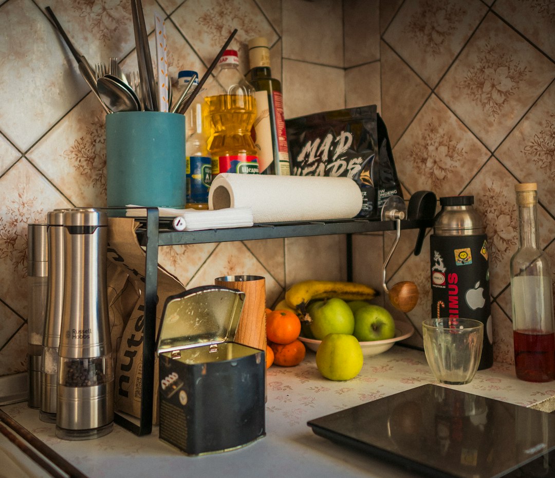 Cabinet organizer keeping kitchen gear upright and separated